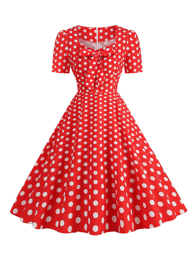 She slips into this 1950s Vintage Sweetheart Bow Swing Dress and suddenly it's a 1950s daydream