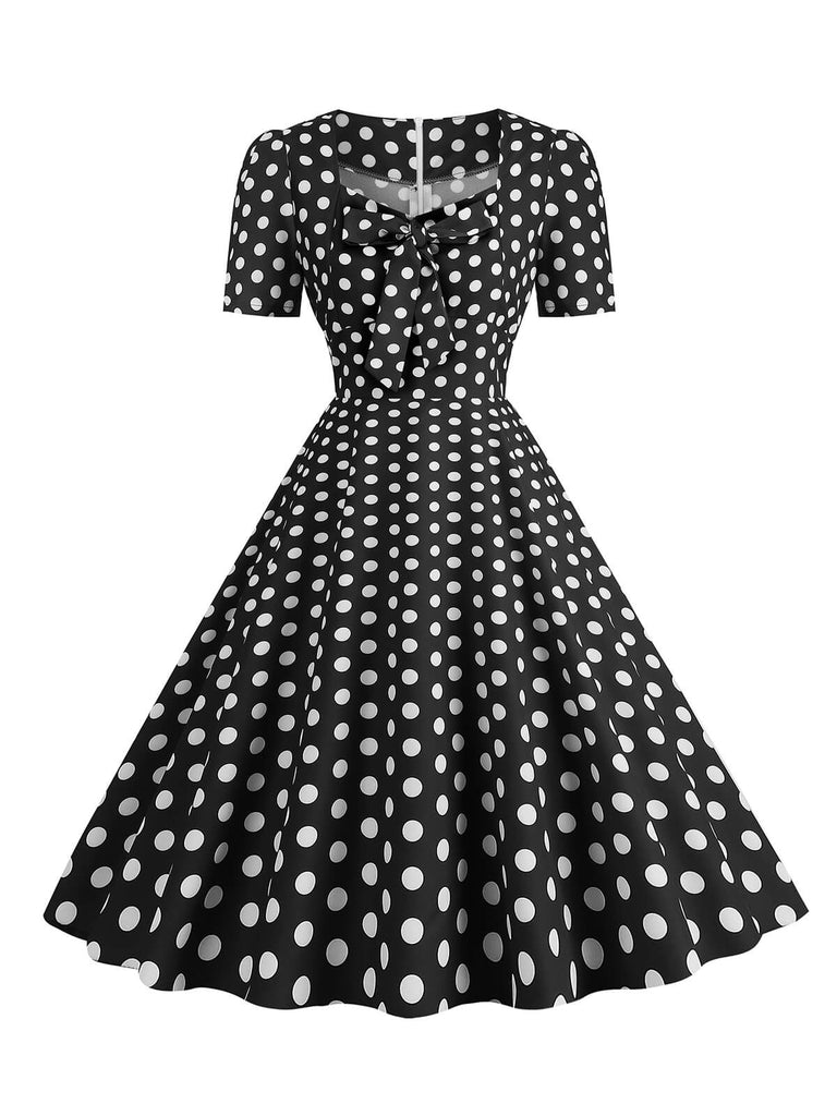 This 1950s Vintage Sweetheart Bow Swing Dress wraps her in 1950s elegance, one twirl at a time