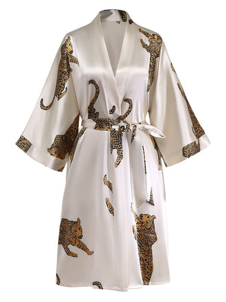 White satin robe with leopard print on a white background