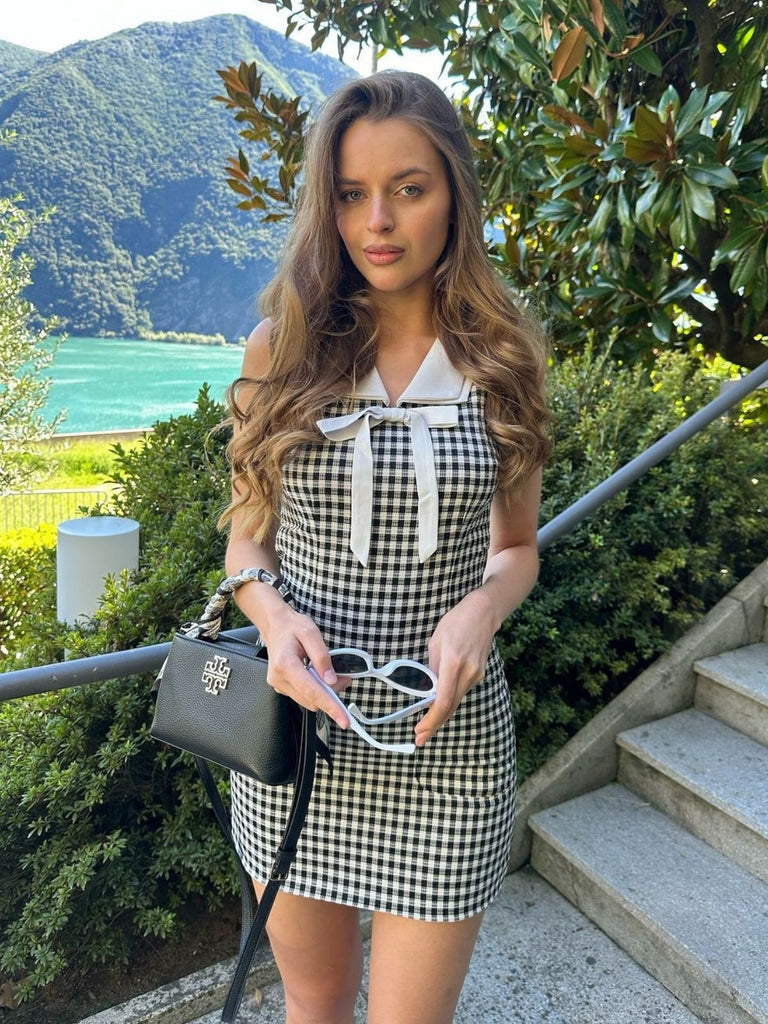 She slips into this 1960s Acetate Gingham Plaid Shift Dress and suddenly it's a 1960s daydream