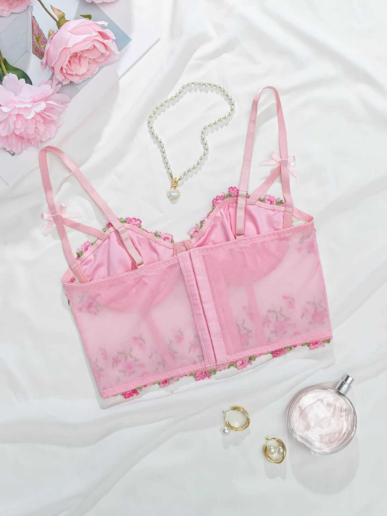 She slips into 1960s Floral Embroidered Bow Underw