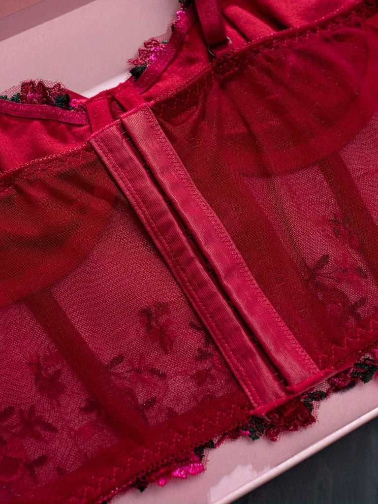 She slips into 1960s Floral Embroidered Bow Underw