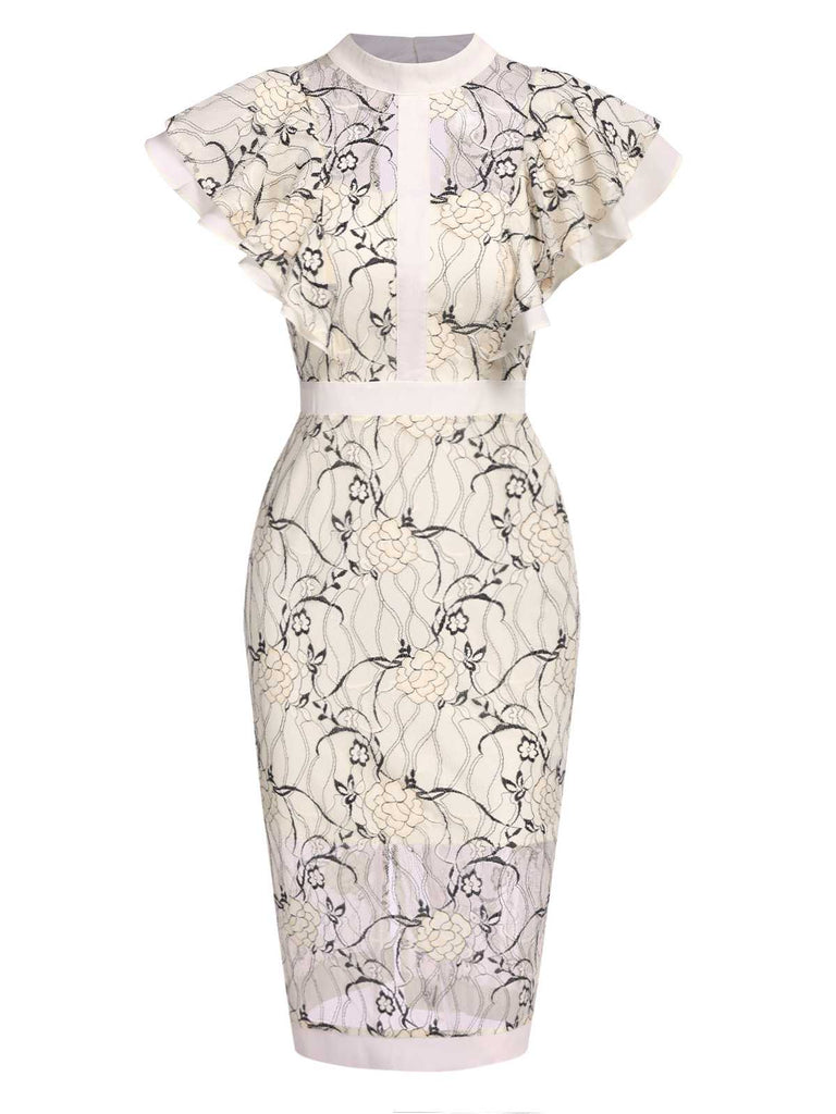 She slips into this 1960s Floral Sheer Lace Pencil Dress and suddenly it's a 1960s daydream