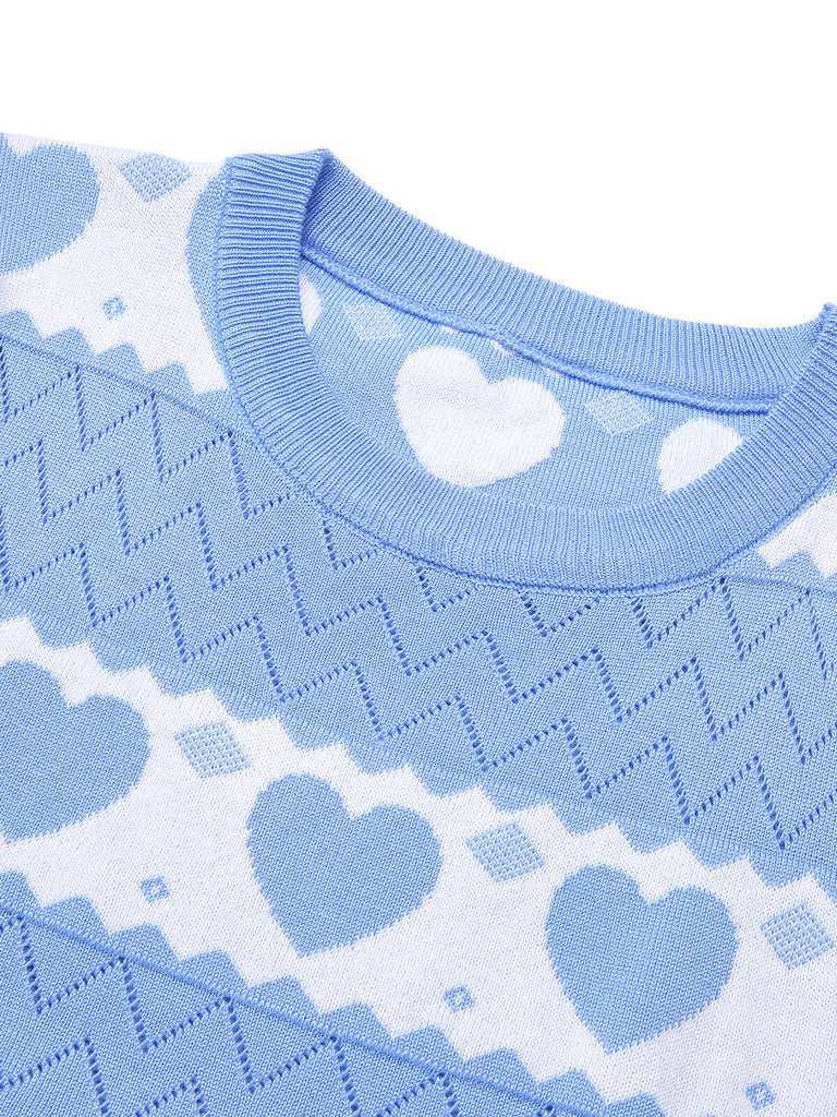 She slips into this 1960s Heart Short Sleeved Knitted Dress and suddenly it's a 1960s daydream
