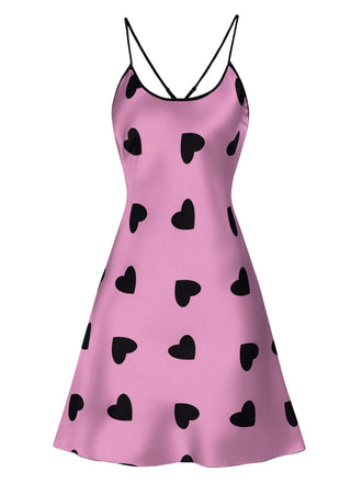 She slips into this 1960s Heart Spaghetti Straps Nightgown and suddenly it's a 1960s daydream