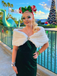 She slips into this 1960s Off Shoulder Velvet Bodycon Dress and suddenly it's a 1960s daydream