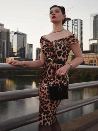She slips into this 1960s Off-shoulder Leopard Pencil Dress and suddenly it's a 1960s daydream