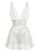 White lace dress with floral patterns on a white background