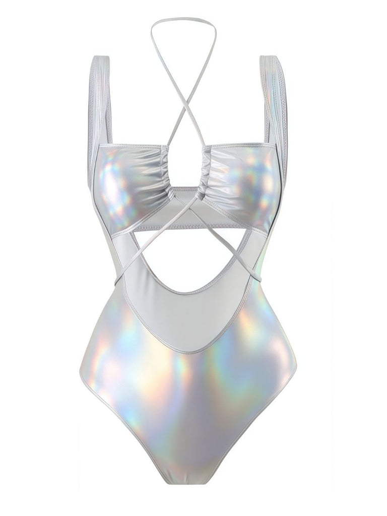 She's wearing 1970s Halter Cut-Out Metallic One-Piece Swimsuit and the whole beach remembers the 1970s