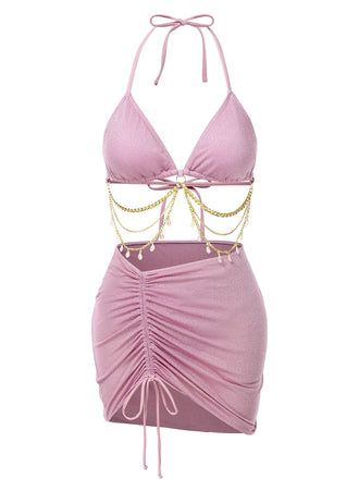 She's wearing 1970s Halter Shimmery Chain Crystal Bikini & Cover-Up and the whole beach remembers the 1970s