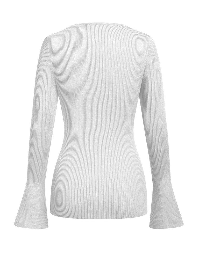 This 1970s Heart Cutout Knitted Solid Sweater whispers 1970s secrets to those who notice
