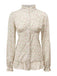 She pairs this 1970s High Neck Ditsy Floral Ruffles Blouse with confidence and 1970s charm
