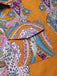 This 1970s Shirt Neck Paisley Print Belted Romper brings 1970s soul to her everyday