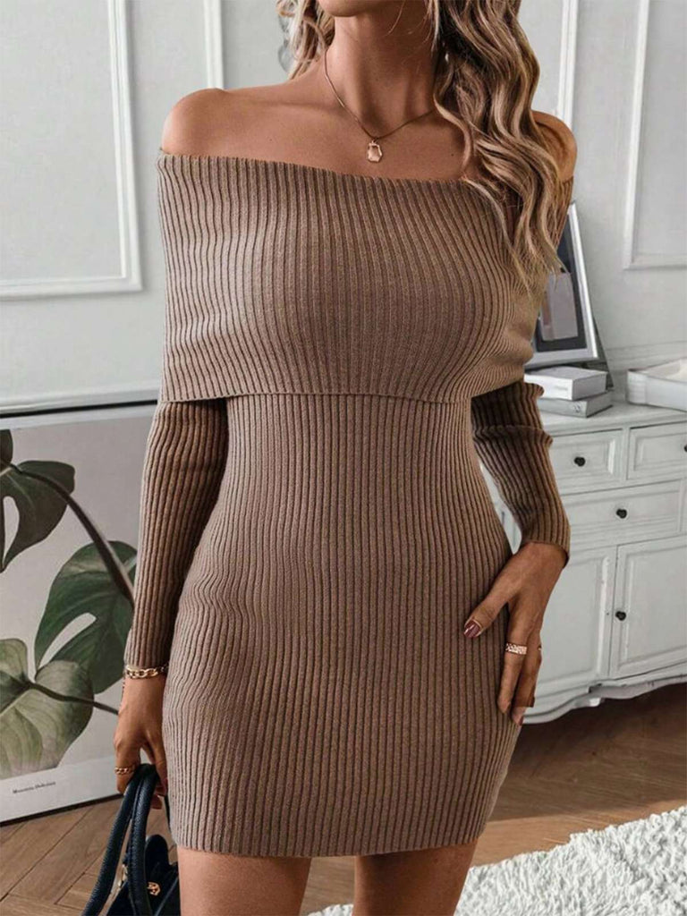 She slips into this 1970s Solid Off-Shoulder Ribbed Knit Dress and suddenly it's a 1970s daydream
