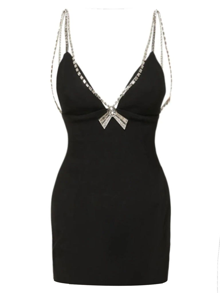 She slips into this 1970s Solid Spaghetti Straps Rhinestones Dress and suddenly it's a 1970s daydream