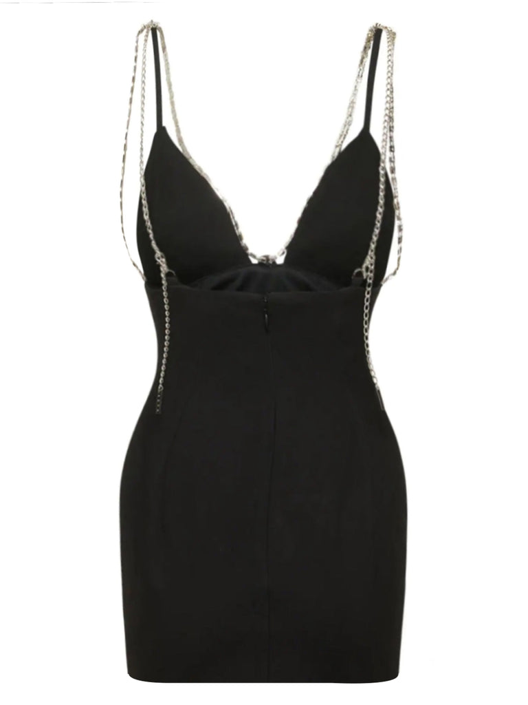 This 1970s Solid Spaghetti Straps Rhinestones Dress wraps her in 1970s elegance, one twirl at a time