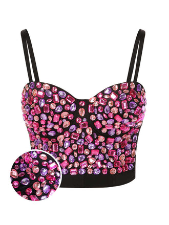 She pairs this 1970s Spaghetti Strap 3D Rhinestone Embellished Crop Top with confidence and 1970s charm