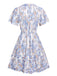 This 1970s V-Neck Ditsy Floral Wrinkle Dress wraps her in 1970s elegance, one twirl at a time