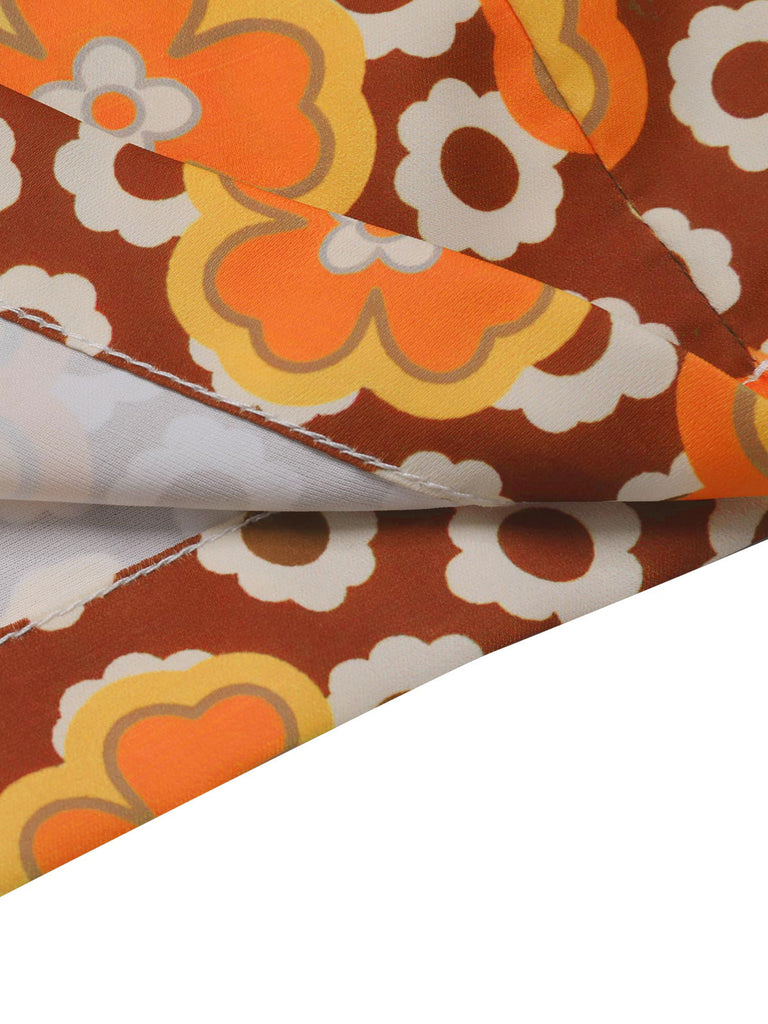 1970s V-Neck Floral Belted Sleeveless Jumpsuit — the 1970s finishing touch that makes her outfit sing