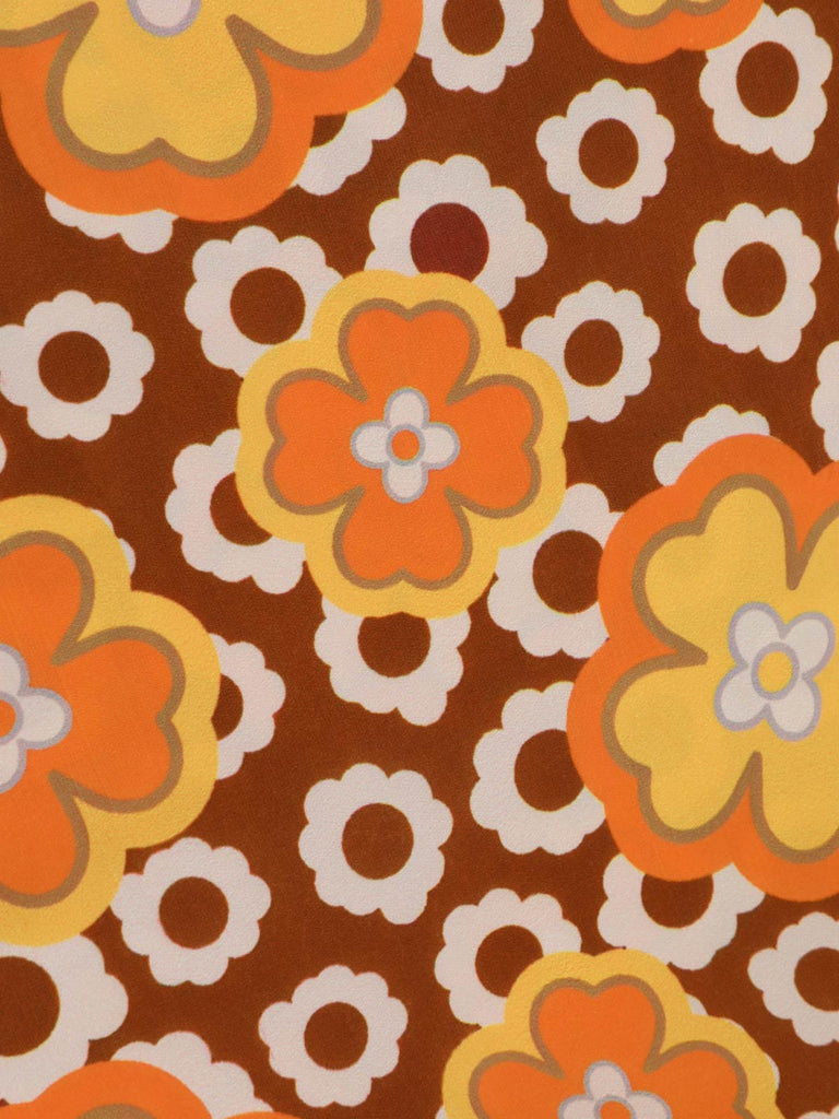 1970s V-Neck Floral Belted Sleeveless Jumpsuit: 1970s detail work for the woman who notices