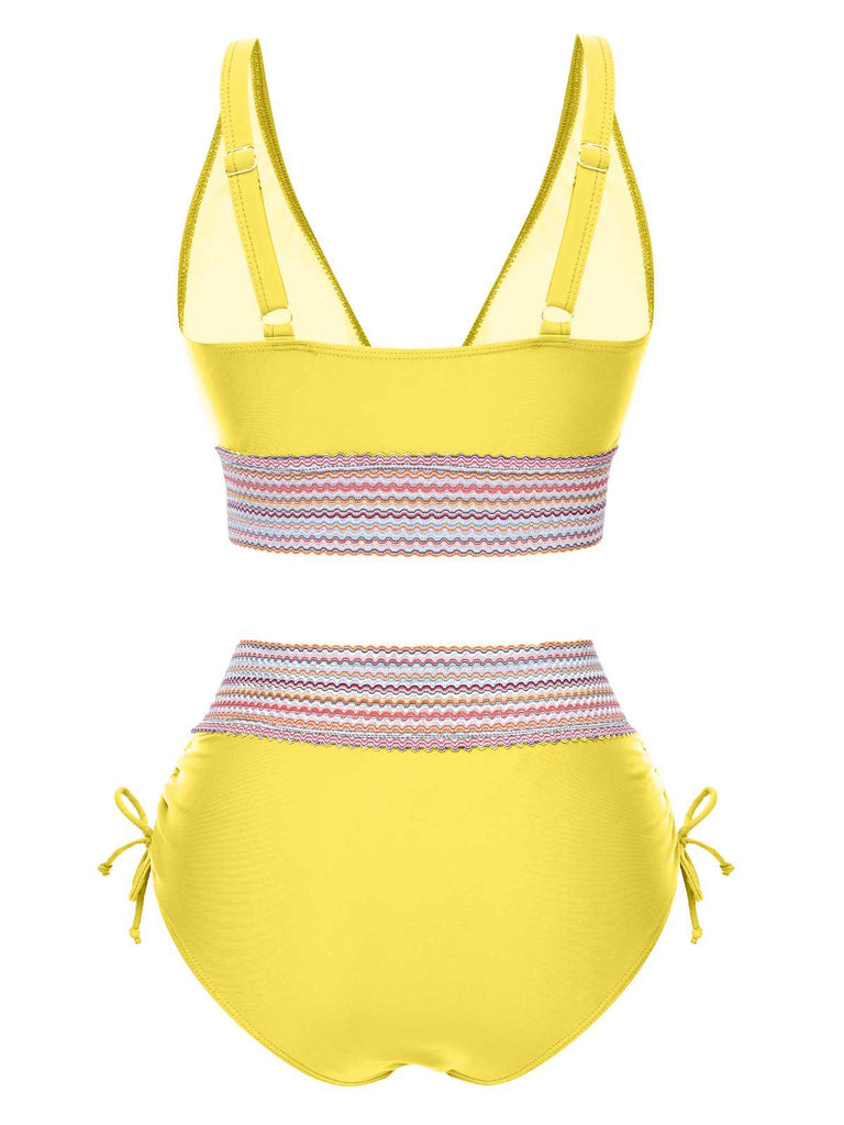 She's wearing 1970s V-Neck Patchwork High-Waist Bikini and the whole beach remembers the 1970s