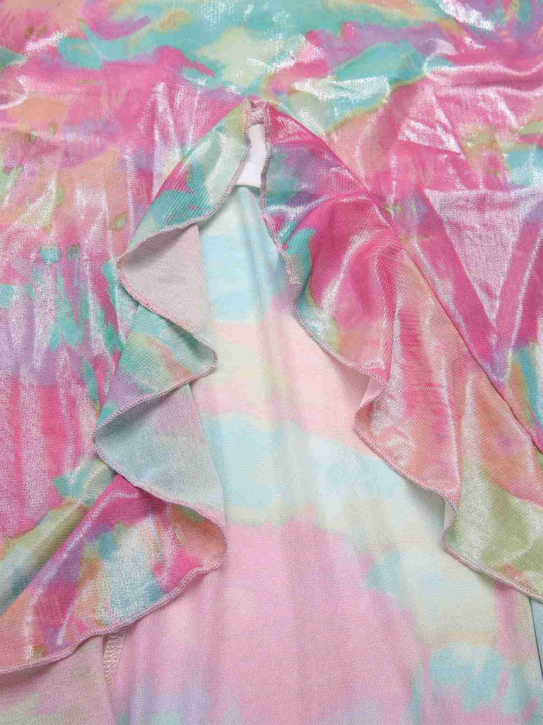 Colorful fabric with pink, green, and blue patterns