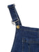 Close-up of blue denim overalls with suspenders on a white background