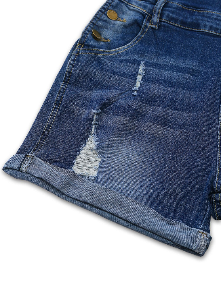 Close-up of blue denim shorts with a white background