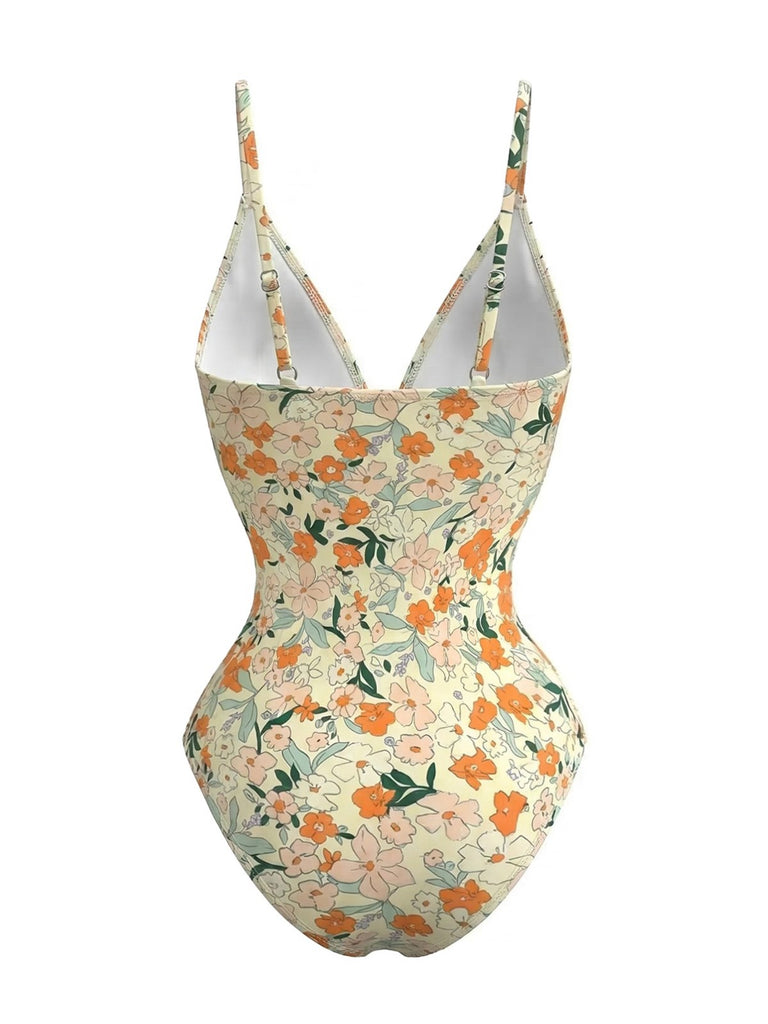 1980s Floral V-Neck Ruched One-Piece Swimsuit | vintage swimwear, retro swimsuit, pin-up style - perfect for retro fashion enthusiasts