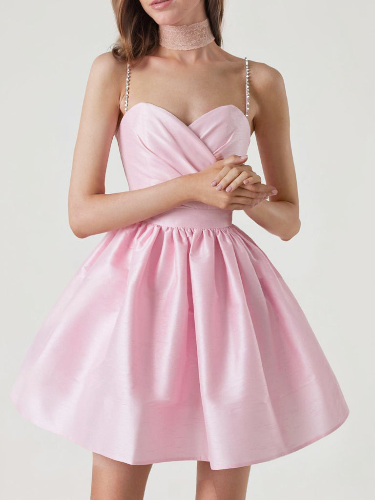 This 1980s Solid Rhinestone Straps Puffy Dress wraps her in 1980s elegance, one twirl at a time