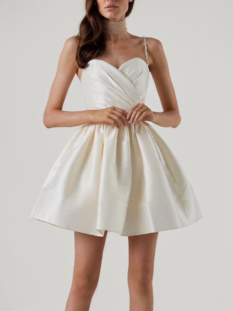 This 1980s Solid Rhinestone Straps Puffy Dress wraps her in 1980s elegance, one twirl at a time