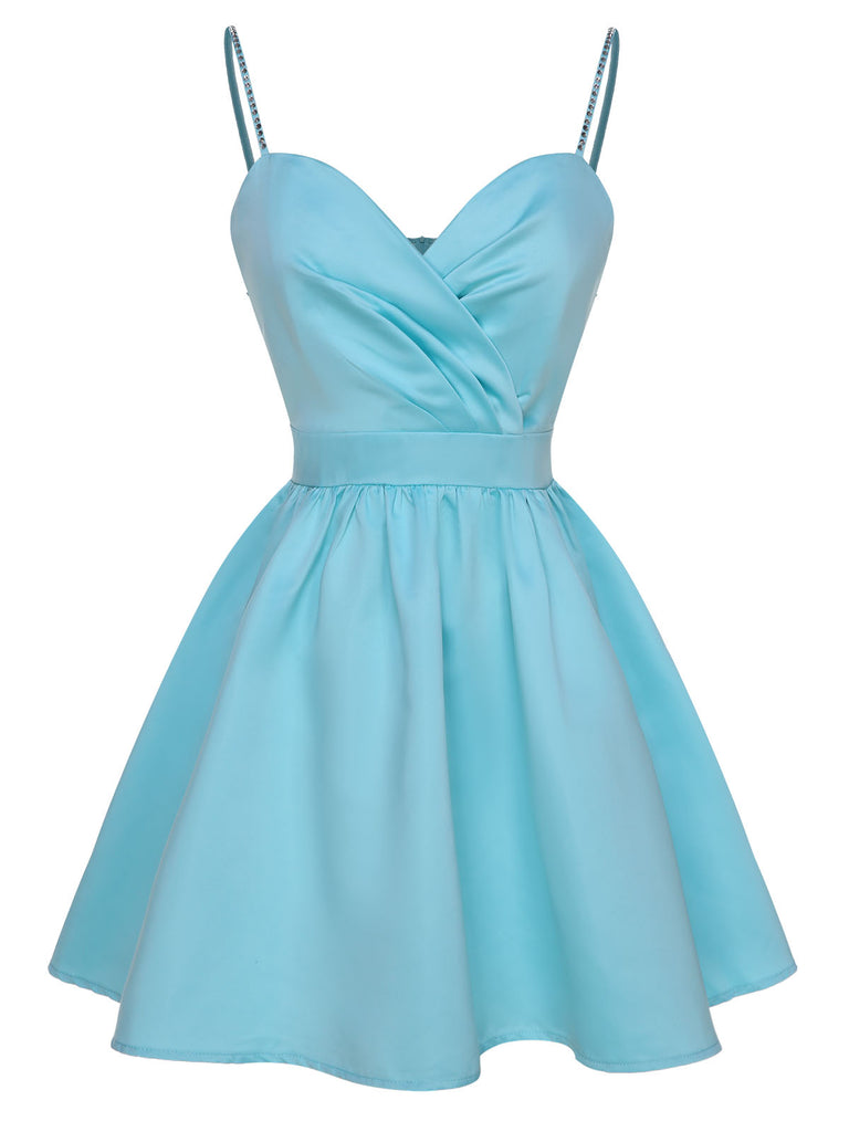 This 1980s Solid Rhinestone Straps Puffy Dress wraps her in 1980s elegance, one twirl at a time