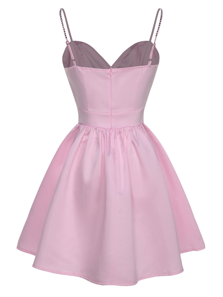 This 1980s Solid Rhinestone Straps Puffy Dress wraps her in 1980s elegance, one twirl at a time