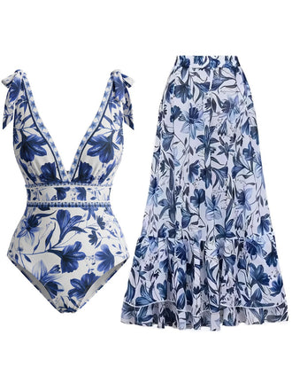 She's wearing 2PCS 1940s Floral Tie-Shoulder Swimsuit Cover-Up and the whole beach remembers the 1940s