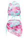 She's wearing 2PCS 1950s Blue Solid Swimsuit & Pink Floral Cover-Up and the whole beach remembers the 1950s