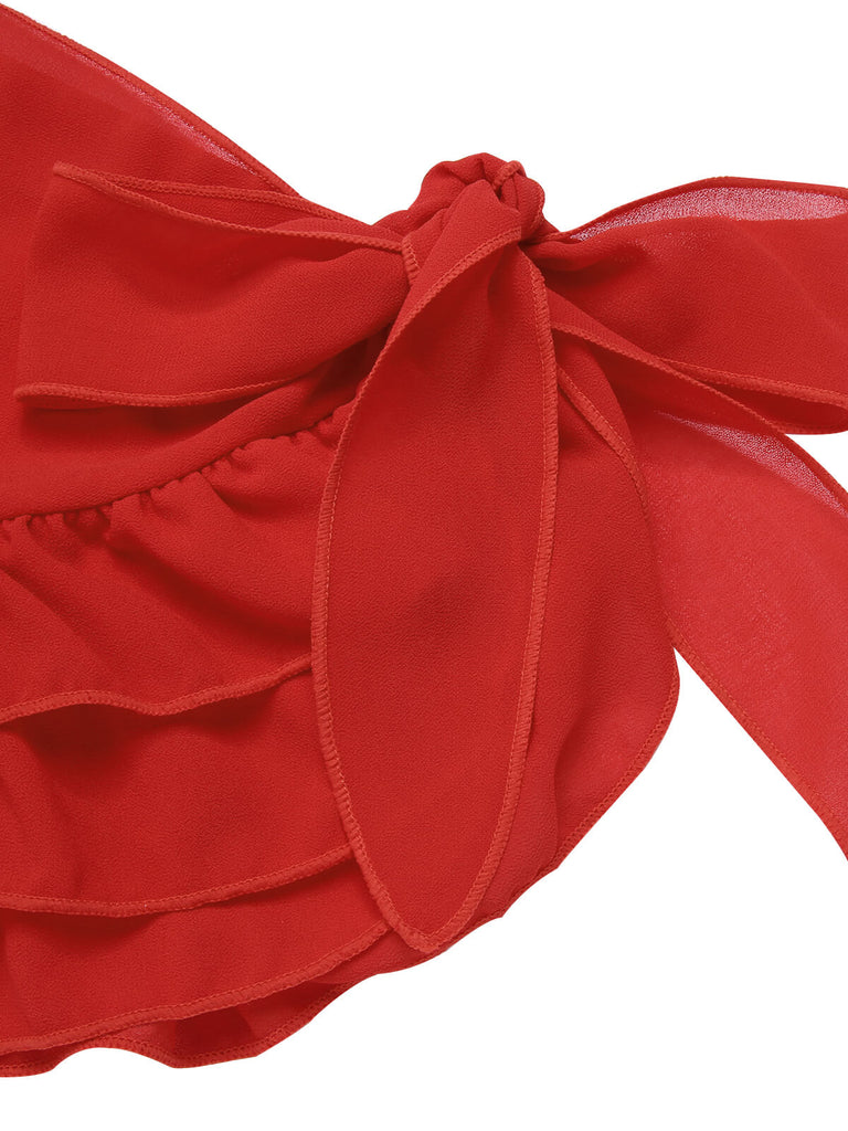 She's wearing 2PCS 1960s Roses Halter Swimsuit & Skirt Cover-Up and the whole beach remembers the 1960s