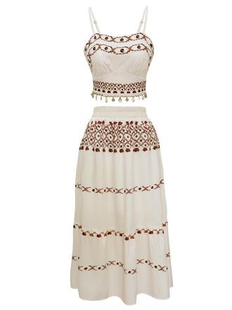She pairs this 2PCS Beige 1970s Bohemian Fringe Strap Top & Skirt with confidence and 1970s charm