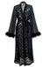 She slips into 2PCS Black 1940s Lace Sheer Sleepwear Set and channels 1940s screen sirens