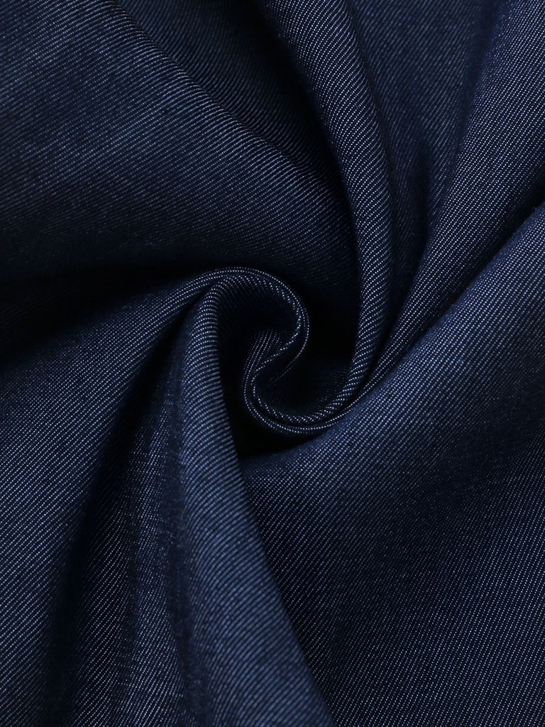 High-resolution detail of the navy blue fabric texture, highlighting the linen-style weave.