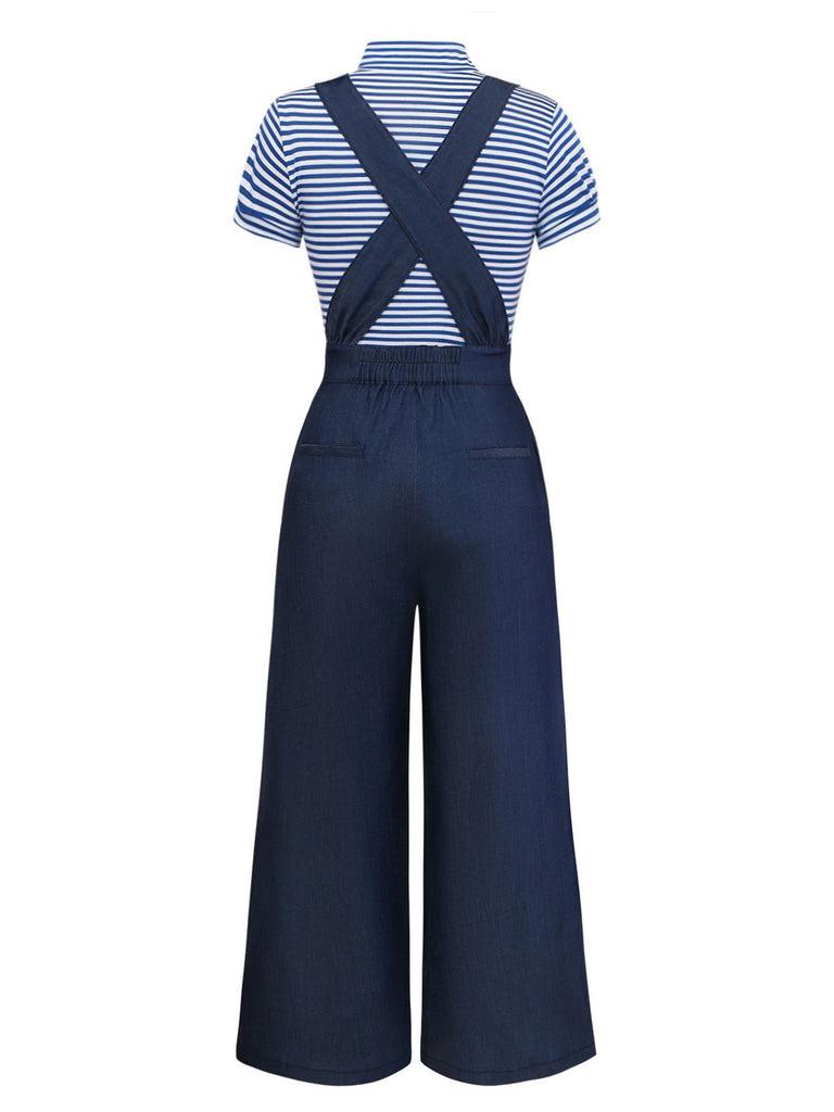 Back view of the navy jumpsuit highlighting the elegant criss-cross strap design and wide-leg cut.