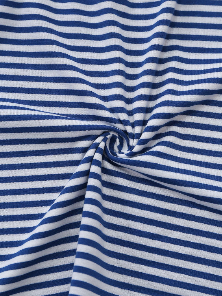 Macro shot of the striped fabric texture showing a soft, breathable weave in a circular swirl.