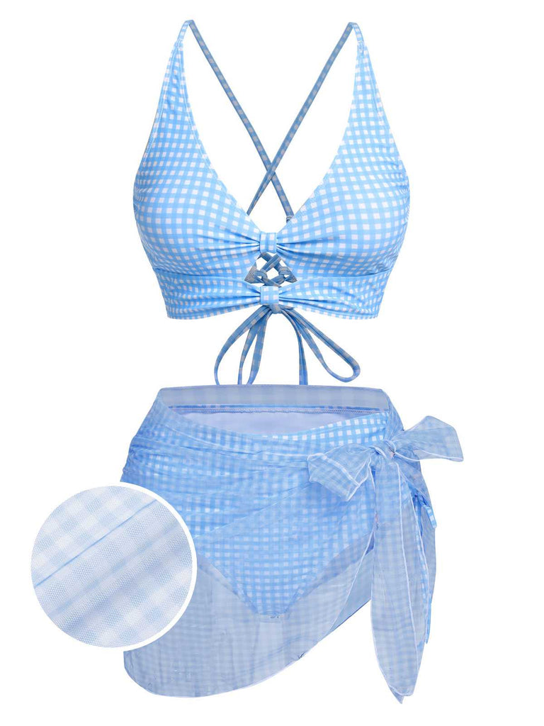 She's wearing 2PCS Blue 1950s Plaids Swimsuit & Mesh Cover-Up and the whole beach remembers the 1950s