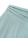 Close-up of a light blue fabric with pleated texture on a white background