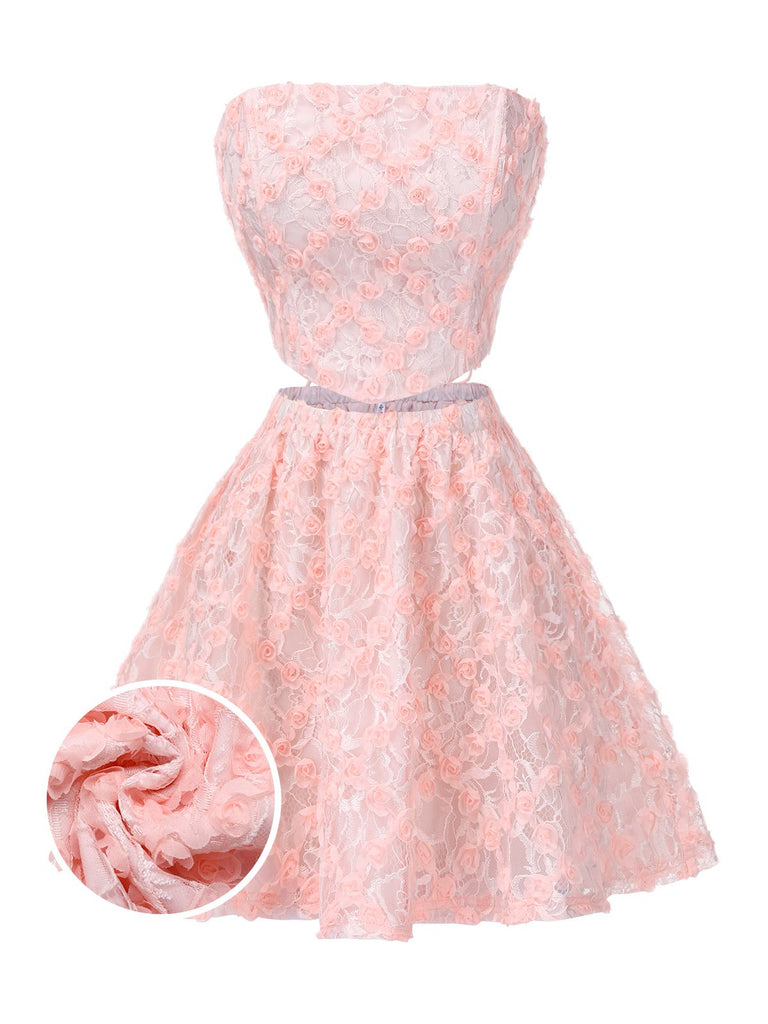 She pairs this 2PCS Pink 1950s 3D-Roses Lace-Up Bandeau Top & Skirt with confidence and 1950s charm