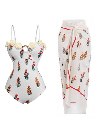 She's wearing 2PCS White 1960s 3D-Flower Spaghetti Straps Swimsuit & Cover-Up and the whole beach remembers the 1960s