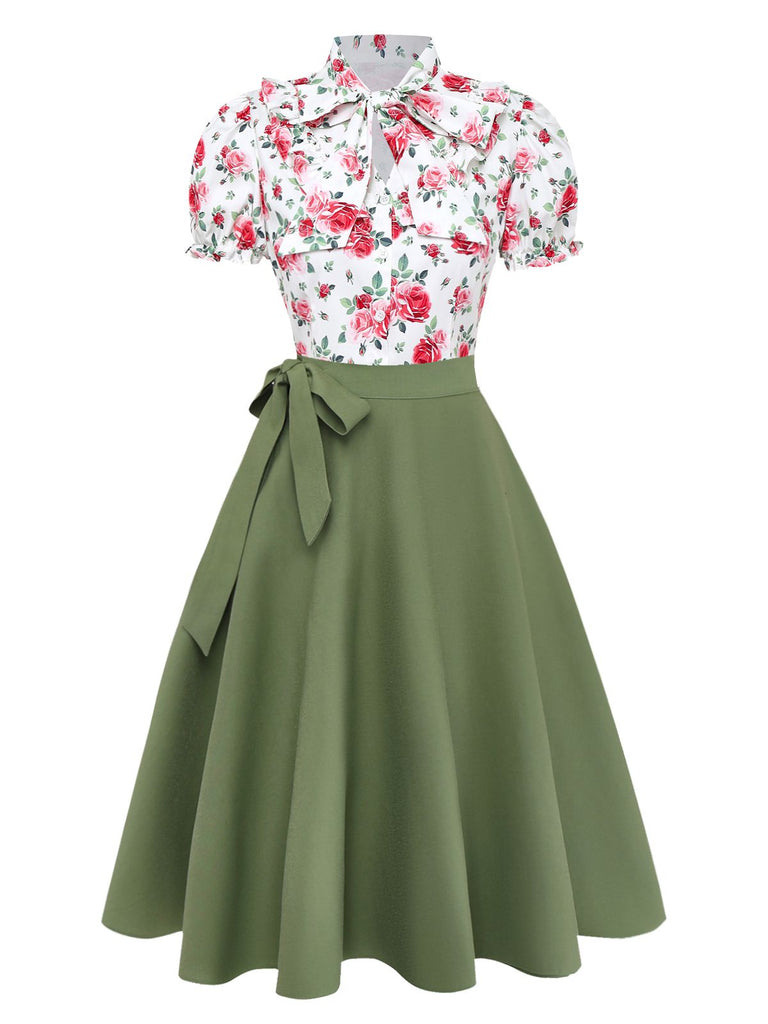 Vintage-style outfit with floral blouse and green skirt on a white background