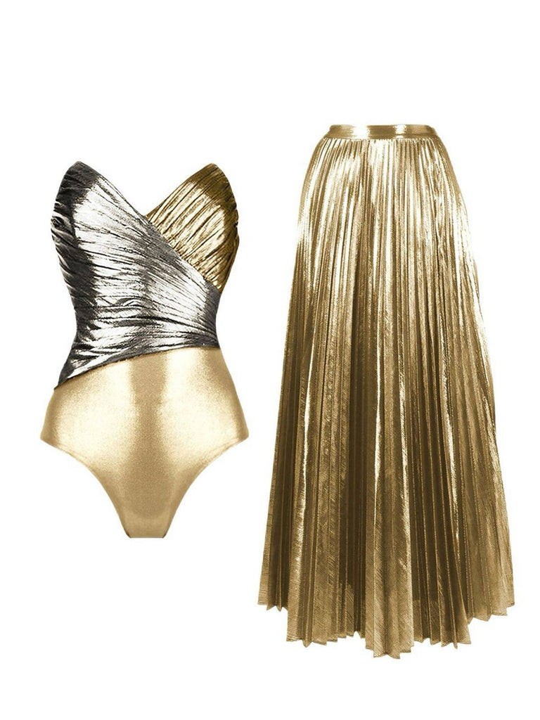 Gold and silver swimsuit with matching skirt on a white background