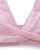 Close-up of a pink bra with eyelet detailing on a white background