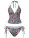 Checkered bikini with cherry pattern on a white background