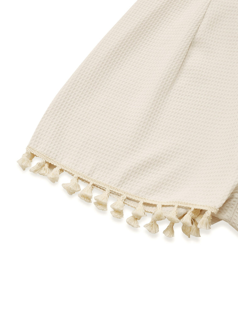 This Beige 1950s Solid Spaghetti Straps Smocked Romper whispers 1950s secrets to those who notice